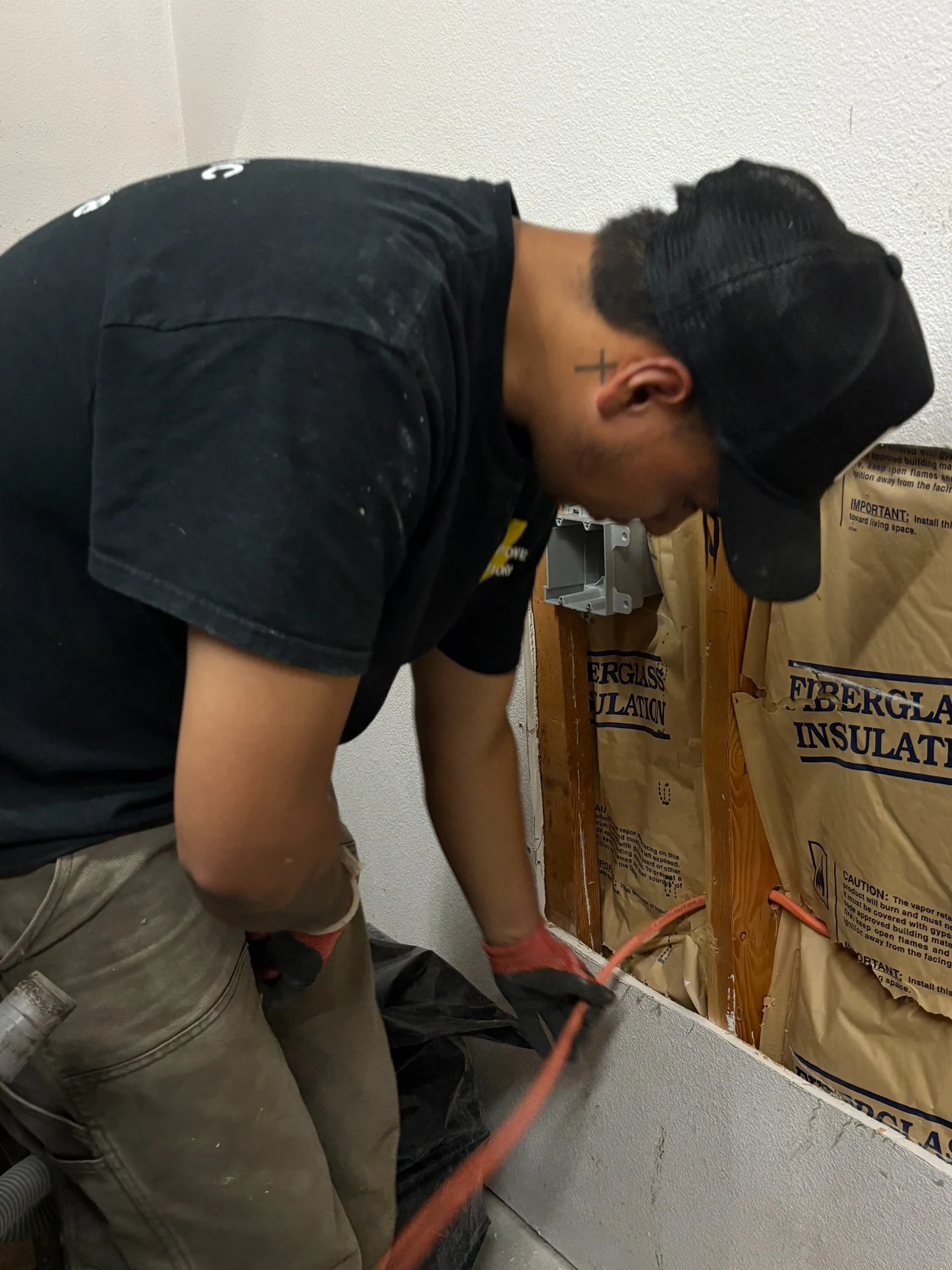 JV Electric electrician performing residential electrical repair work