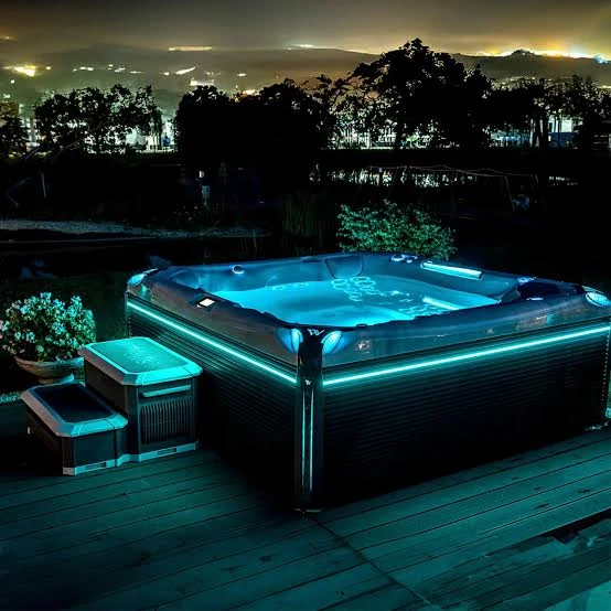 Outdoor hot tub and swim spa with integrated lighting