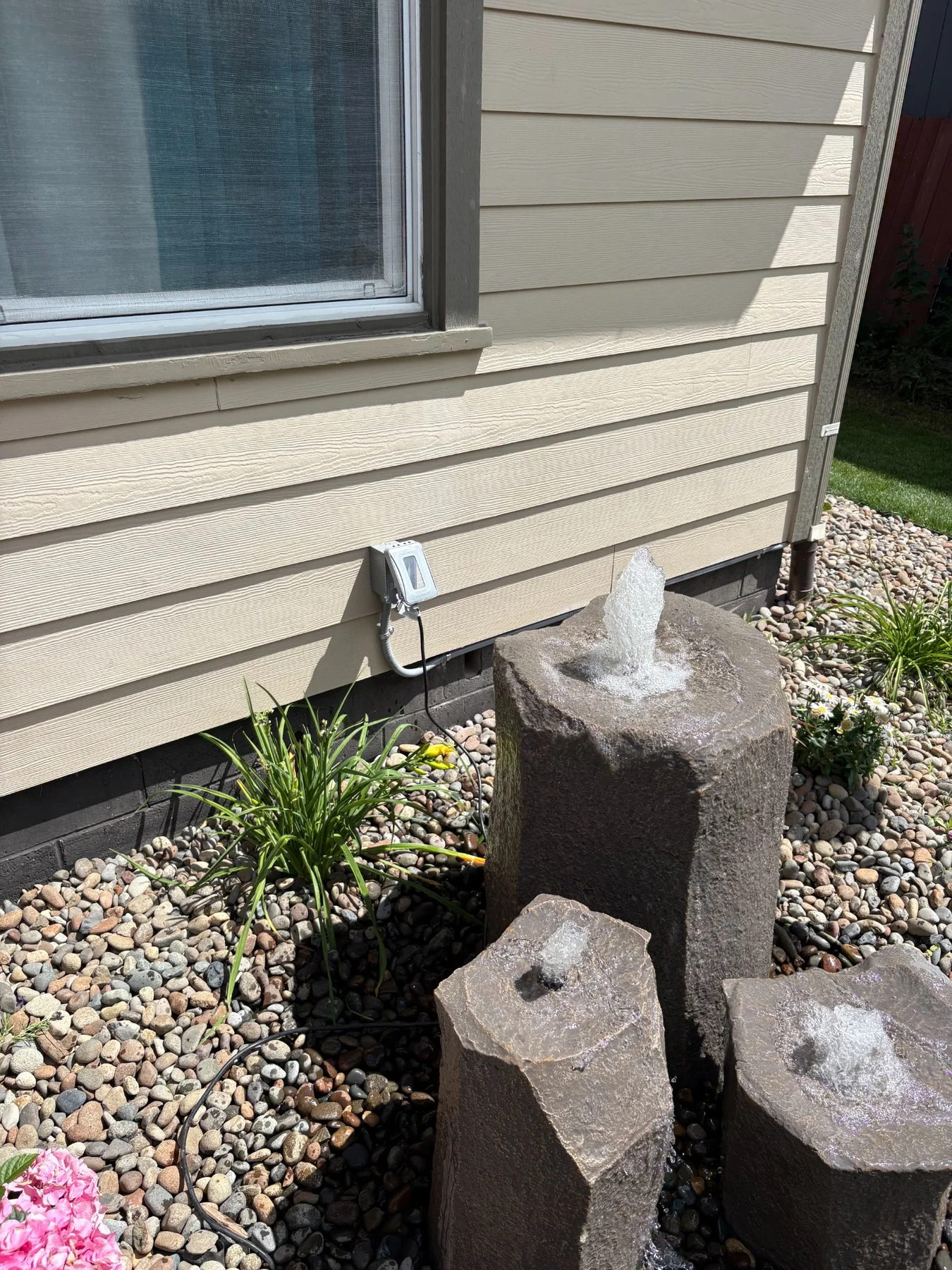 Outdoor GFCI power beside a water feature